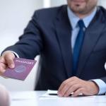 First Step of Your Relocation to Paris Region: Getting a Visa and Work Permit - 11_Passport_AdobeStock_297796061_1920x1080